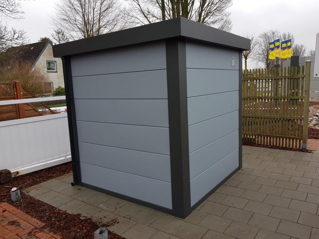 The Telluria Eleganto 2121 metal steel shed store in light grey from behind.