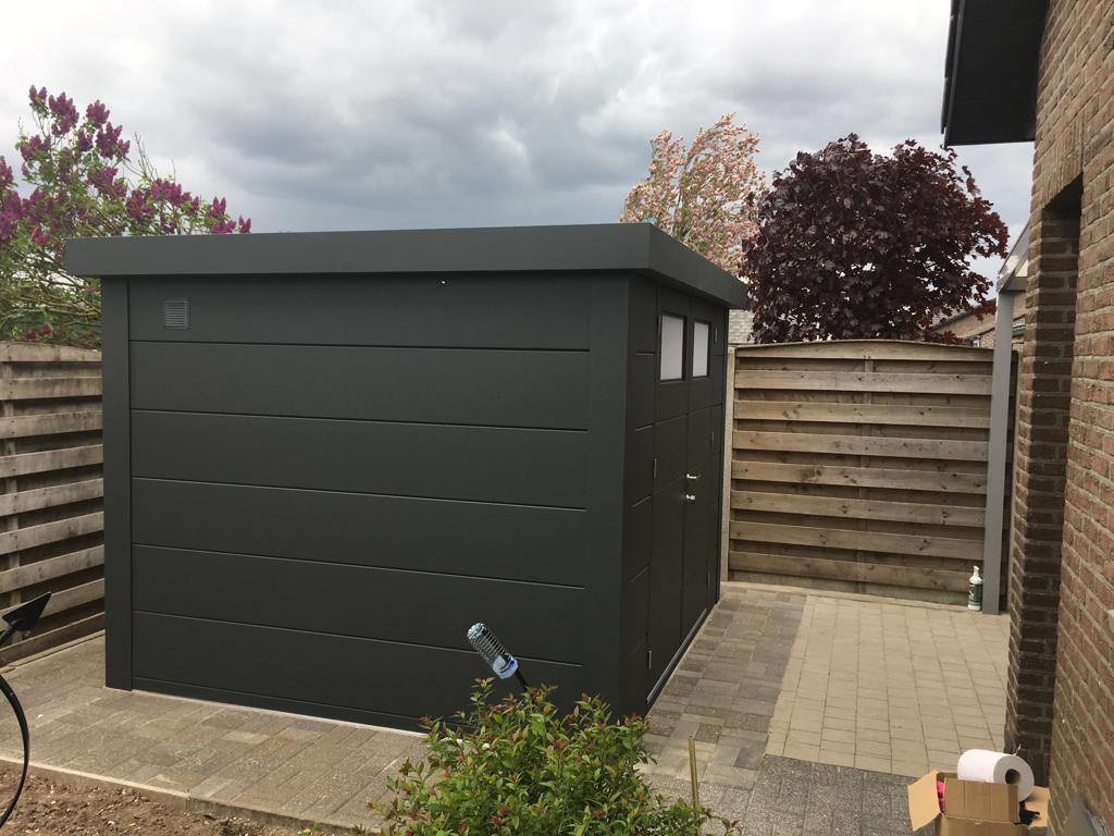 A Side View Photo of The Eleganto 2724 Metal Steel Shed in a Display Site in Anthracite