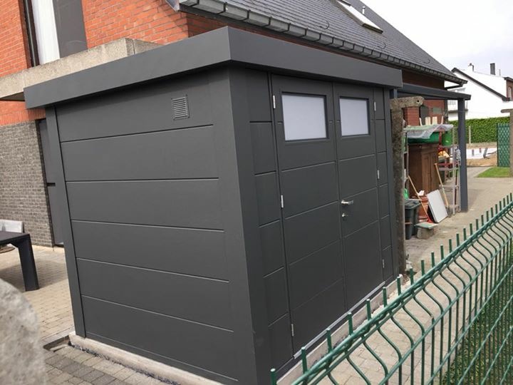 An Angled Photo of The Eleganto 2724 Metal Steel Shed in a Display Site in Anthracite