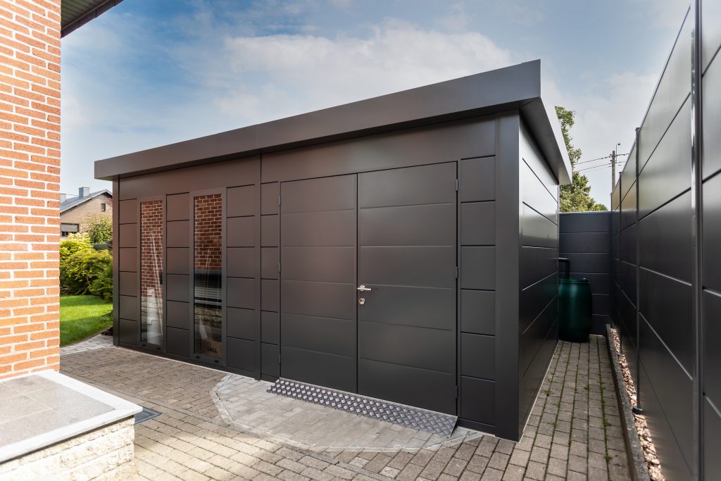 An Angled Photo On A Driveway Of The Eleganto 5435 Metal Steel Building In Anthracite