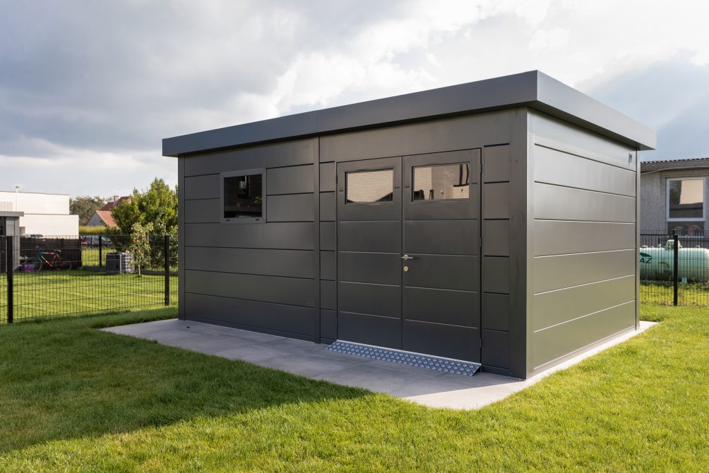 An Angled Photo In A Field Of The Eleganto 5435 Metal Steel Building In Anthracite